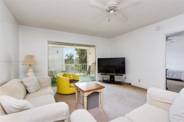 living room with ceiling fan