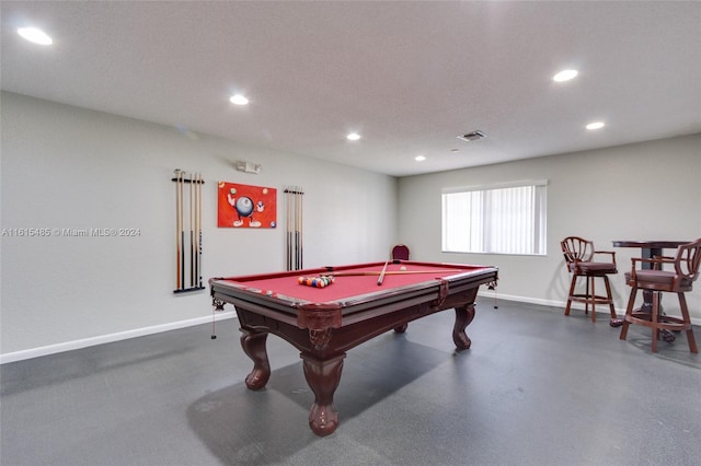 rec room with a textured ceiling and pool table