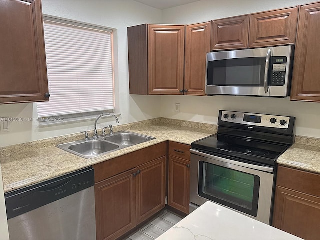 kitchen with stainless steel appliances and sink