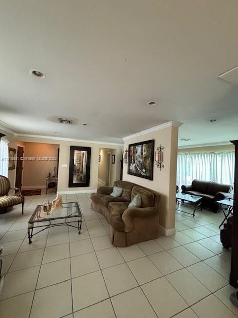 tiled living room featuring ornamental molding