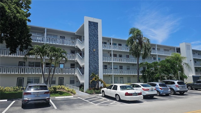 1044 Harwood Unit D, Deerfield Beach, FL 33442 - view of apartment building / complex featuring uncovered parking