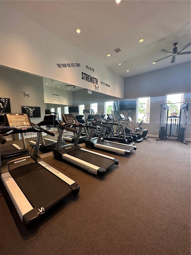 exercise room with visible vents, recessed lighting, baseboards, and a ceiling fan