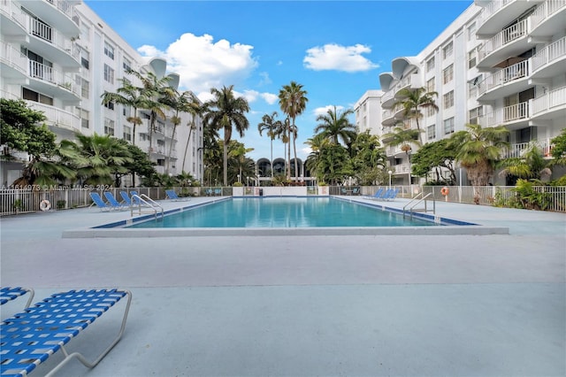 view of swimming pool featuring a patio area