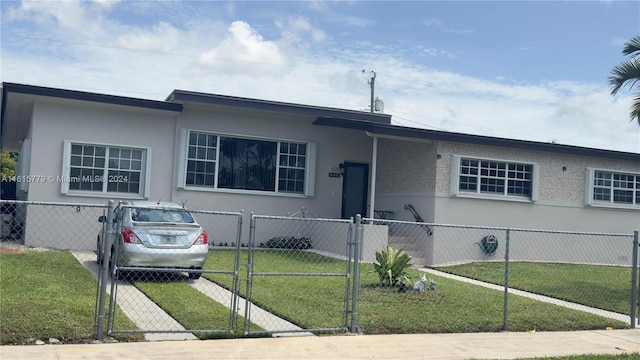 8441 SW 32nd Ter, Miami, FL 33155 - view of front facade featuring a fenced front yard and a gate