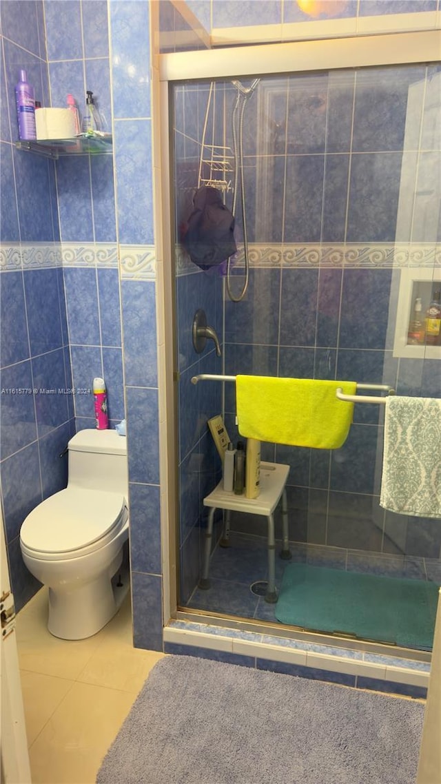8441 SW 32nd Ter, Miami, FL 33155 - full bathroom with a stall shower, tile walls, and tile patterned floors