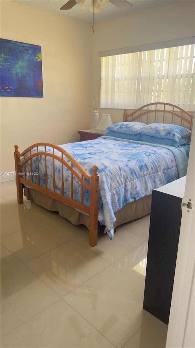 8441 SW 32nd Ter, Miami, FL 33155 - bedroom featuring tile patterned floors and ceiling fan