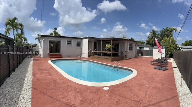 8441 SW 32nd Ter, Miami, FL 33155 - view of swimming pool with a fenced backyard, a patio area, entry steps, and a ceiling fan