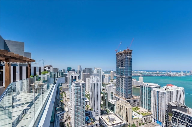 property's view of city featuring a water view