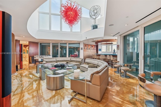 living room featuring a high ceiling