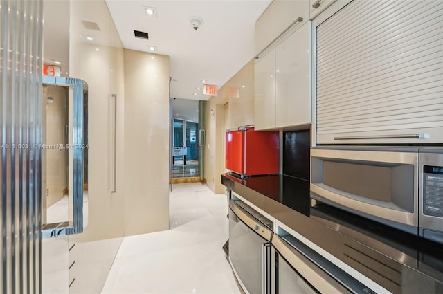 kitchen with white cabinets