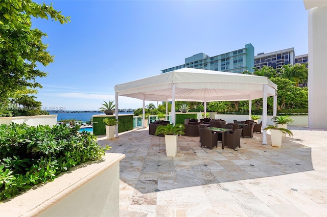 view of patio / terrace with a water view