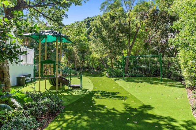 view of play area with a yard