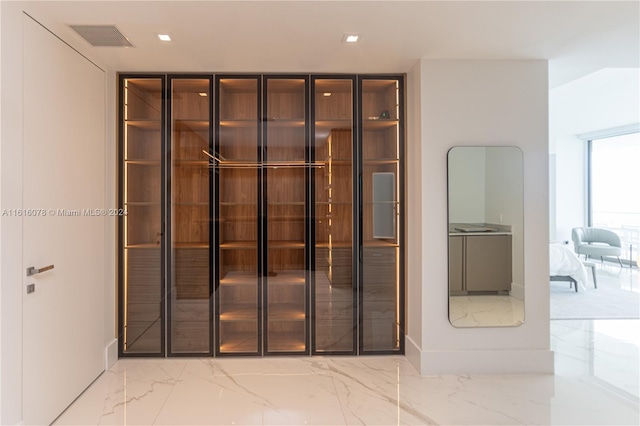 interior space with tile patterned floors