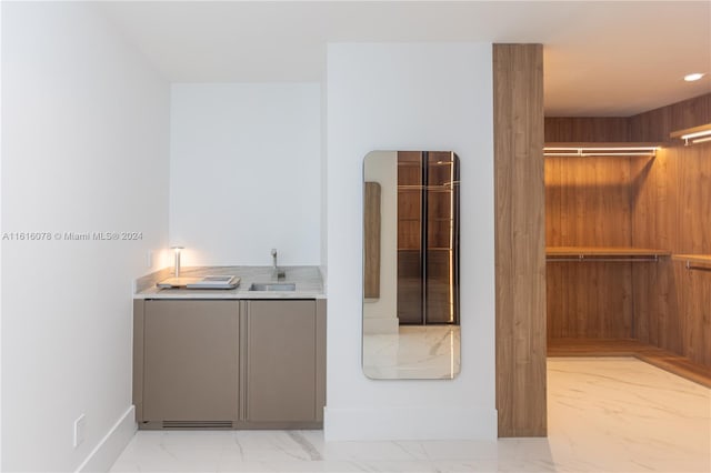 bathroom with tile patterned floors and sink