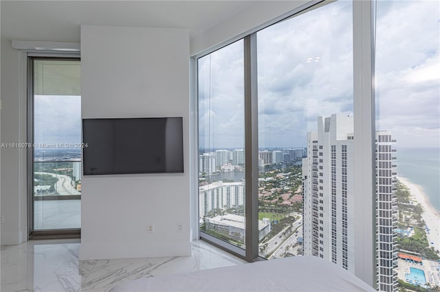 unfurnished bedroom featuring light tile patterned flooring and multiple windows