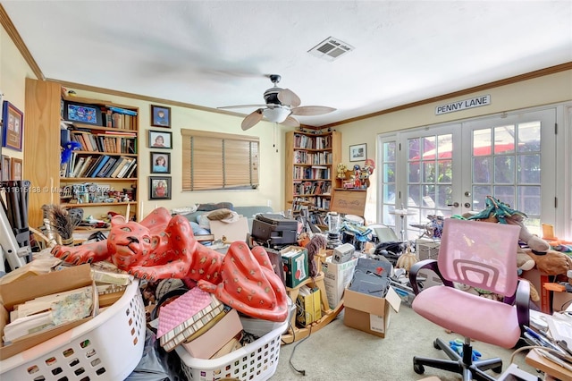 office with french doors, crown molding, and ceiling fan