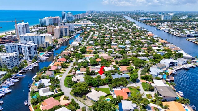 bird's eye view with a water view