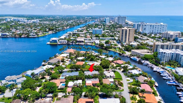 birds eye view of property featuring a water view