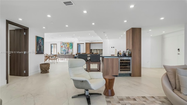 living room featuring beverage cooler