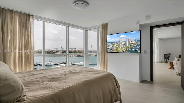 bedroom with a wall of windows