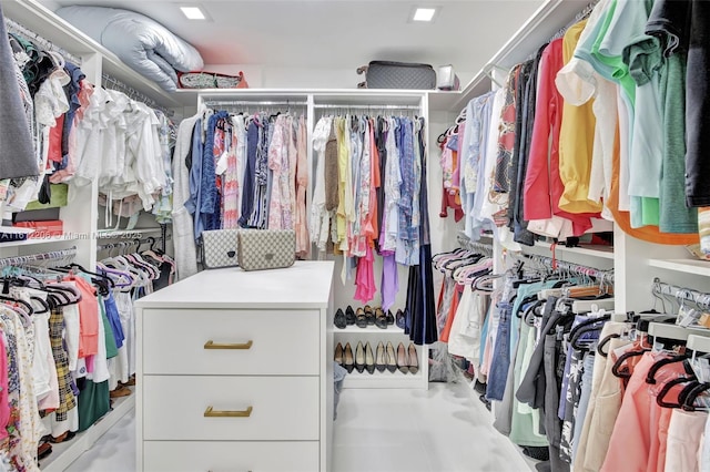 walk in closet featuring light tile patterned floors