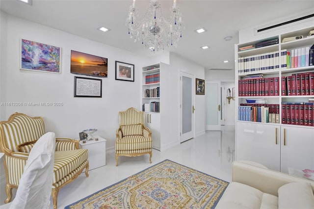 sitting room with a chandelier and recessed lighting