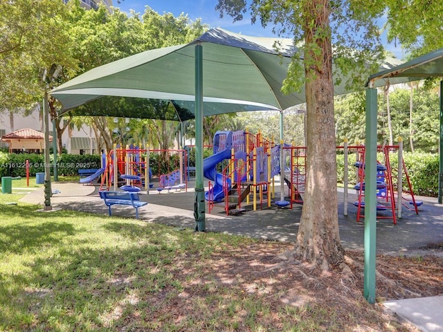 community playground featuring a yard