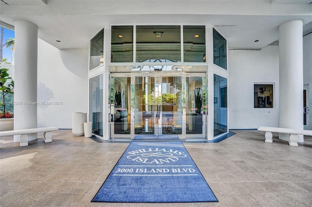 property entrance featuring stucco siding