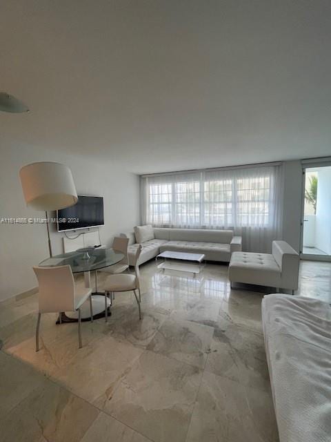 living room with a healthy amount of sunlight