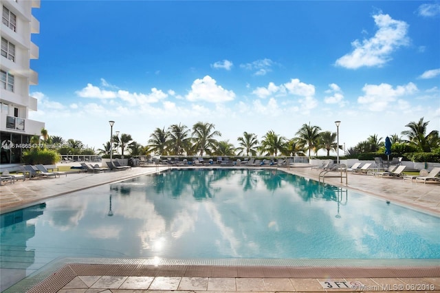 view of pool featuring a patio area