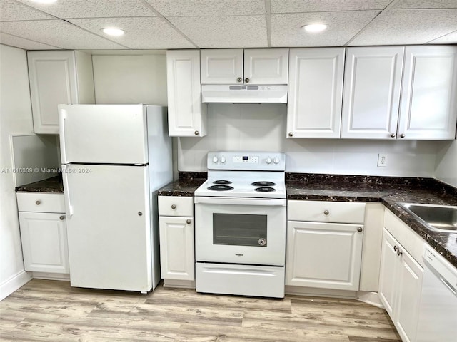 kitchen with white cabinets, a paneled ceiling, light hardwood / wood-style floors, sink, and white appliances