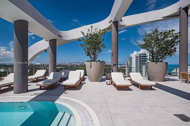 view of patio / terrace with a water view