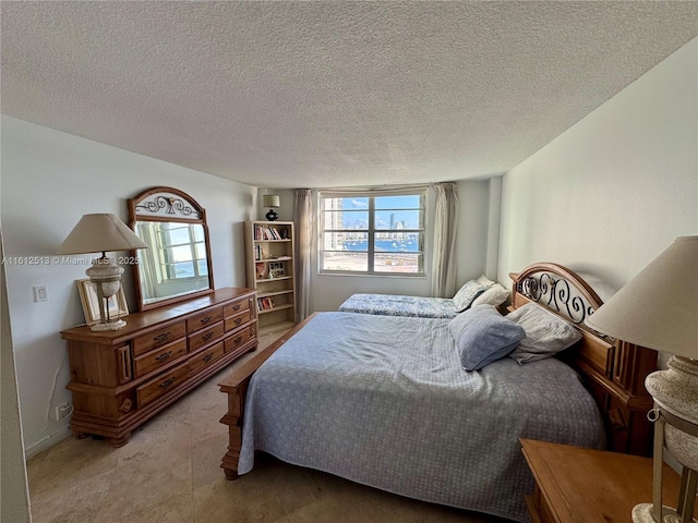 bedroom with a textured ceiling