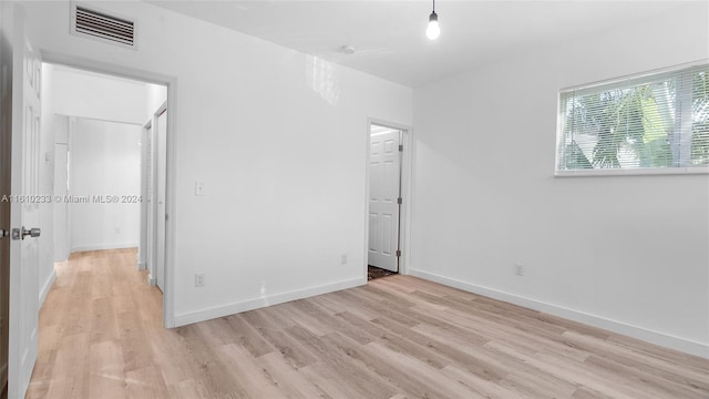 unfurnished bedroom featuring light hardwood / wood-style floors