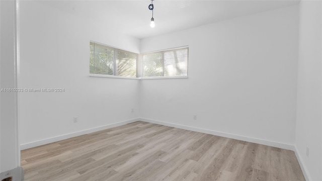 empty room featuring light hardwood / wood-style floors