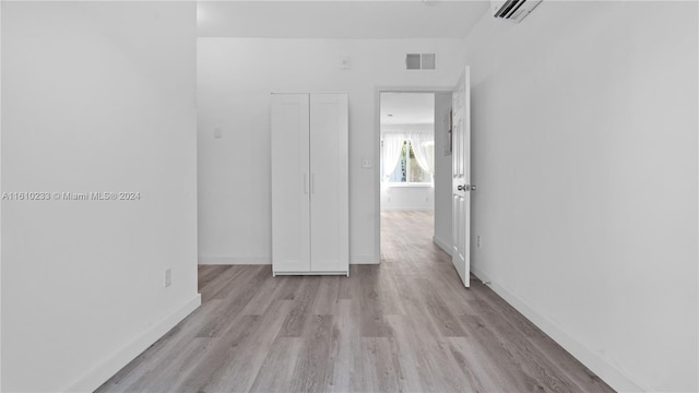 empty room featuring light hardwood / wood-style floors