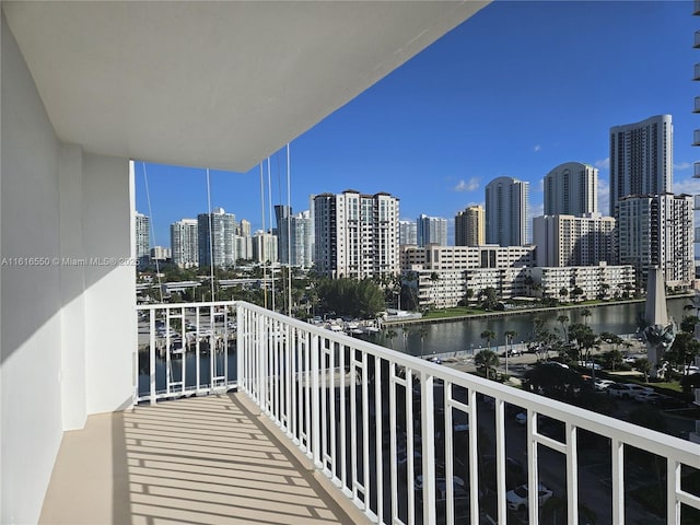 balcony featuring a water view