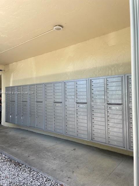 view of home's community featuring a mail area