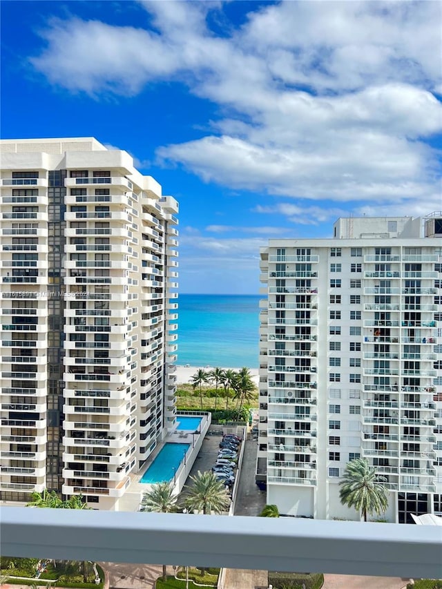 view of property with a water view