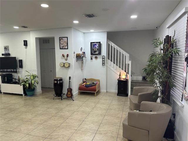 interior space with light tile patterned floors