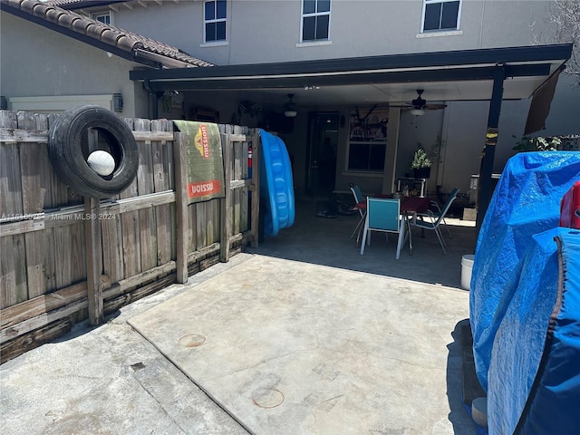 view of patio with ceiling fan