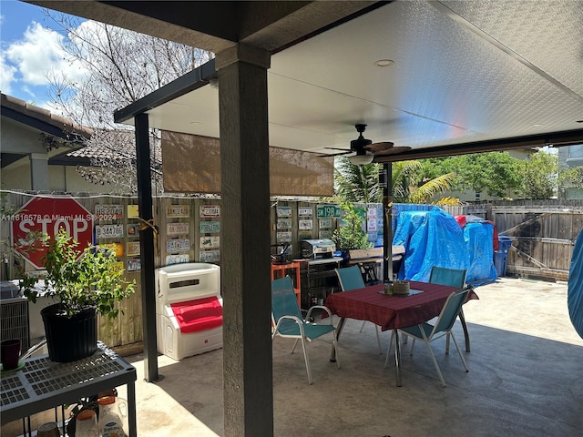 view of patio with central AC unit and ceiling fan