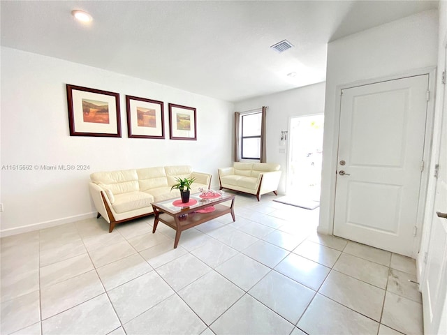 living room with light tile patterned floors