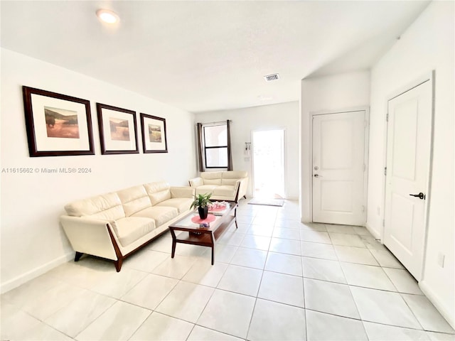 living room featuring light tile patterned floors