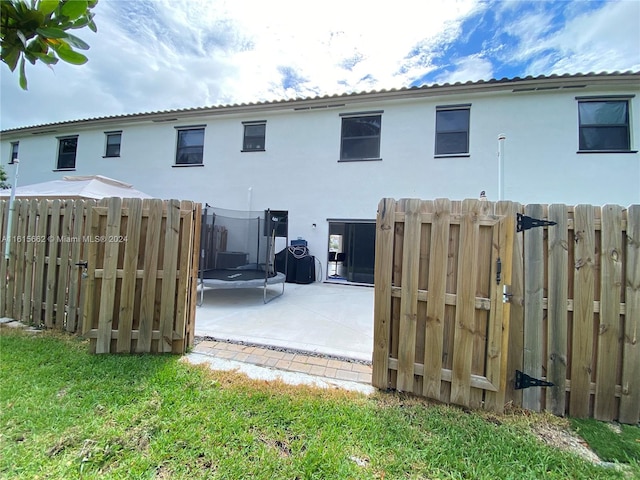 back of house featuring a patio