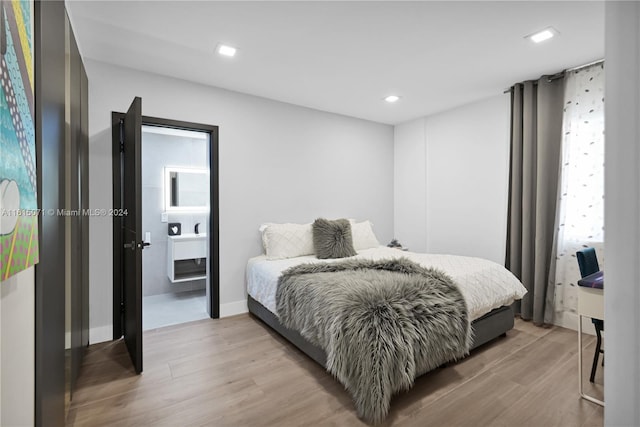 bedroom featuring light wood-type flooring