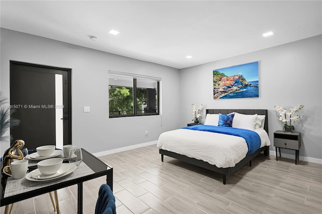 bedroom featuring light hardwood / wood-style floors