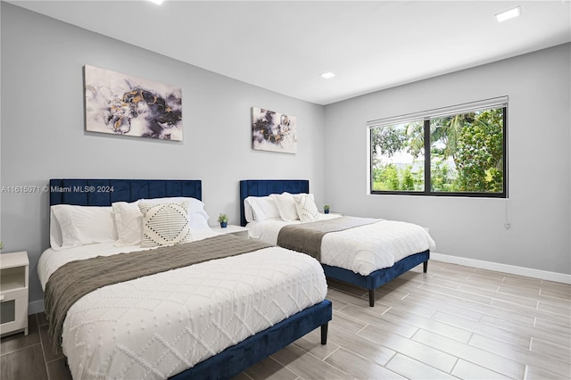 bedroom featuring wood-type flooring