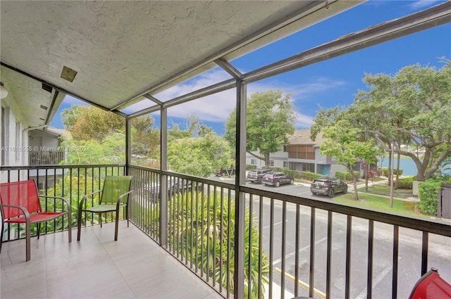 balcony featuring a sunroom