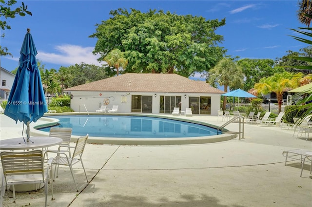 view of pool featuring a patio area